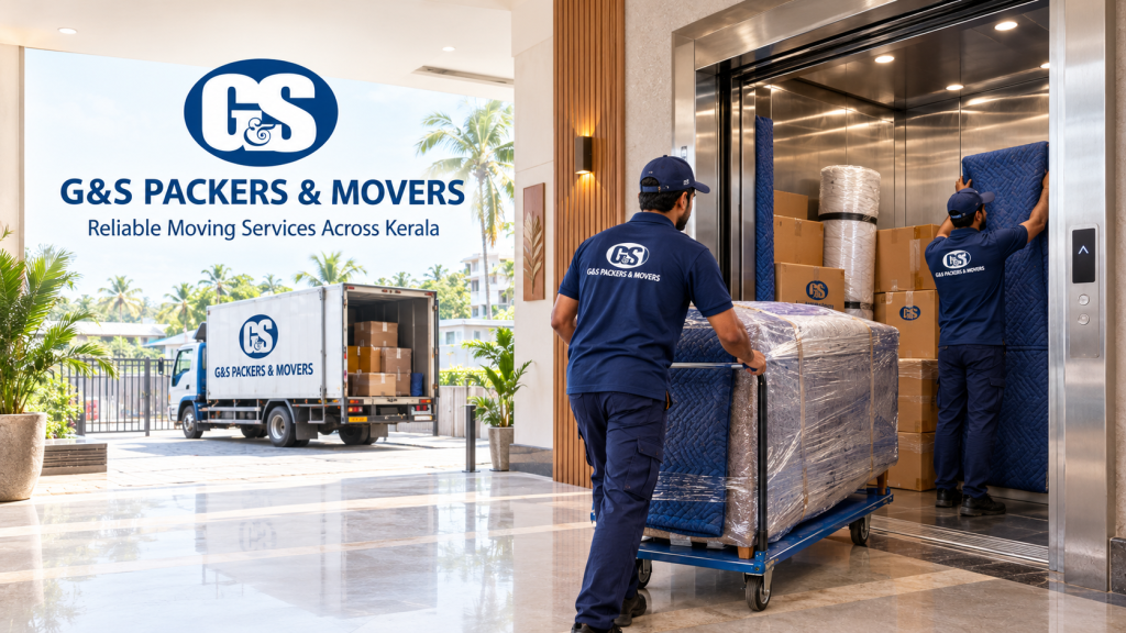 Movers loading furniture into a service lift during high-rise apartment moving in Kochi